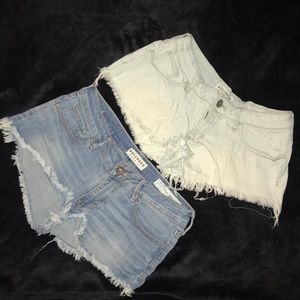 2 pairs of light wash frayed short shorts. size 5